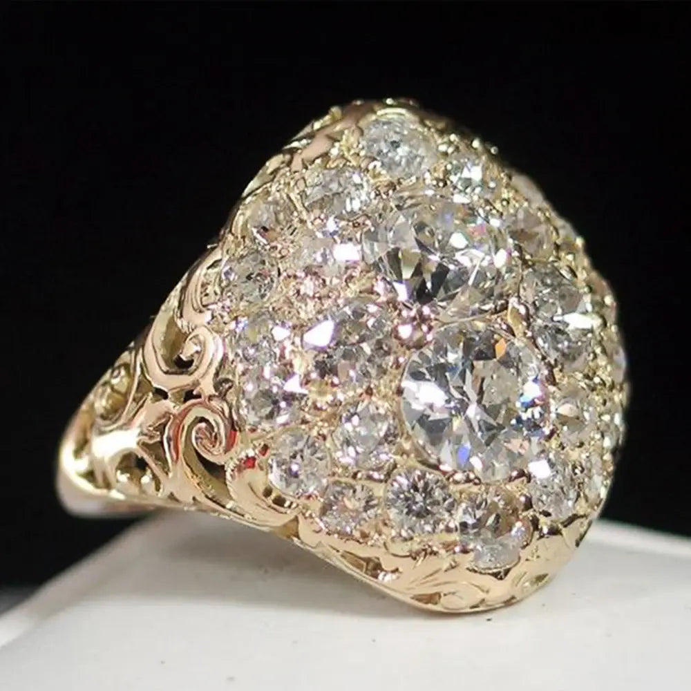Anillo Vintage Redondo Dorado con Diamante