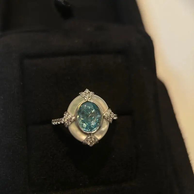 Anillo ajustable vintage intemporal en plata blanca y aguamarina